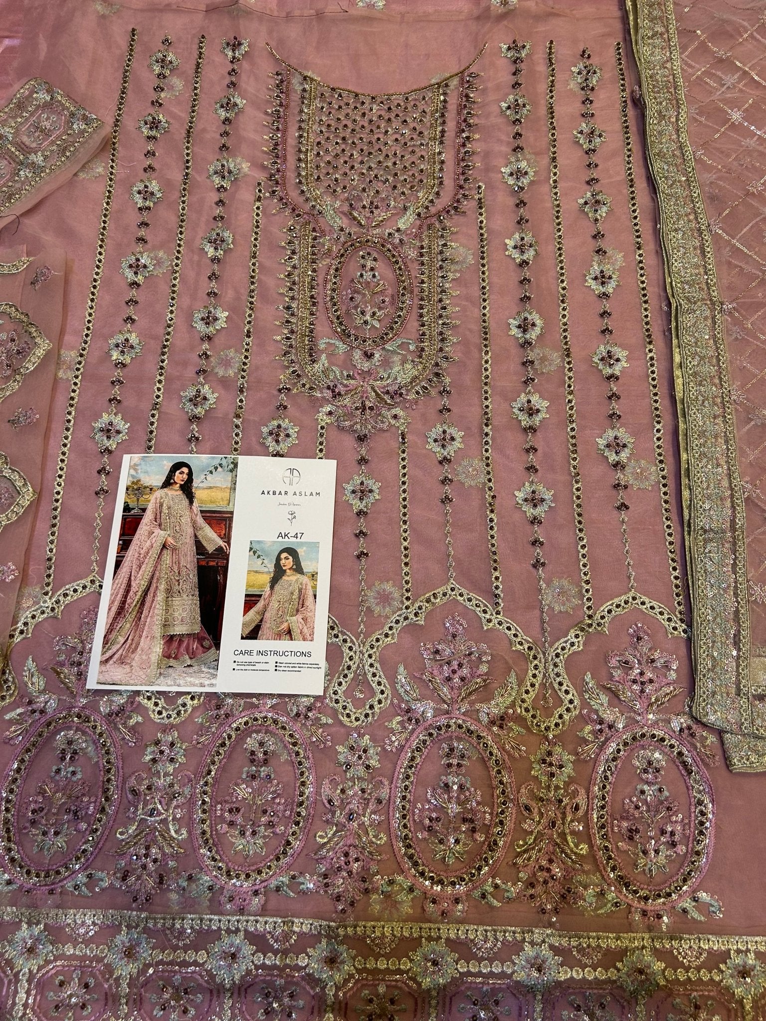 AKBAR ASLAM - UB.ELEGANCE