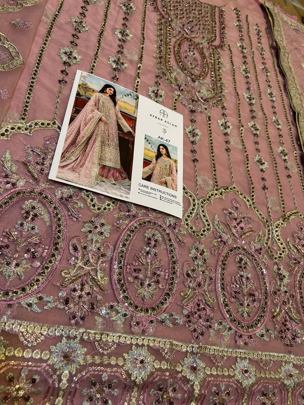 AKBAR ASLAM - UB.ELEGANCE